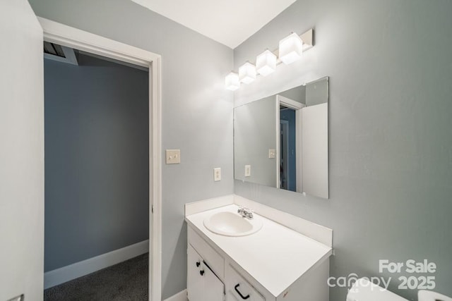 6126 Eagle Peak Dr, Charlotte, NC 28214 - half bath with baseboards, toilet, and vanity