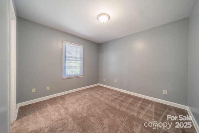 6126 Eagle Peak Dr, Charlotte, NC 28214 - empty room with baseboards and carpet