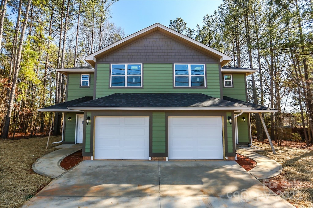 view of front of property featuring a garage