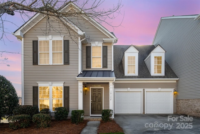 view of front of house with a garage