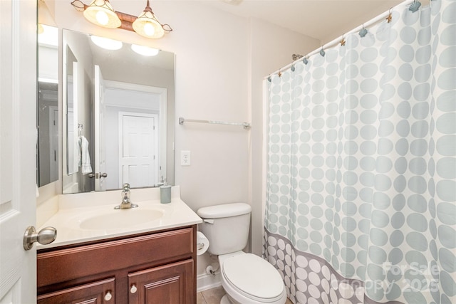 bathroom with toilet, tile patterned flooring, curtained shower, and vanity