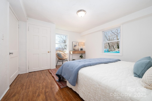 bedroom featuring wood finished floors