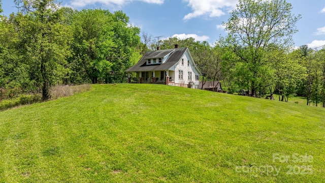 view of yard featuring a porch