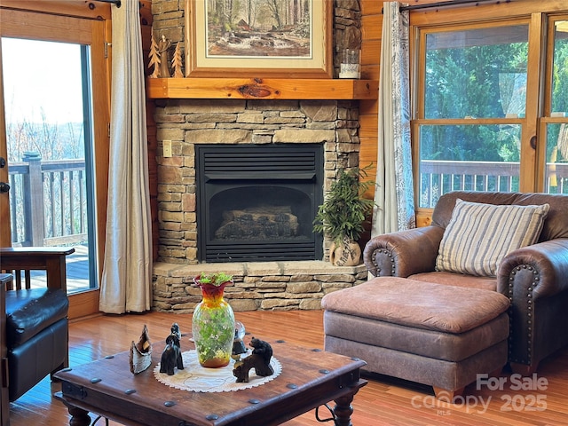 202 Panorama Dr, Nebo, NC 28761 - living room with wood finished floors and a stone fireplace