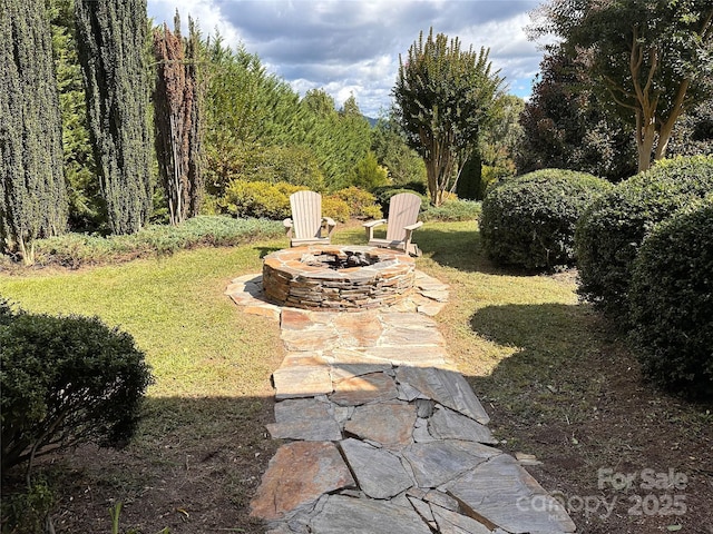 202 Panorama Dr, Nebo, NC 28761 - view of green lawn with a fire pit and a view of trees