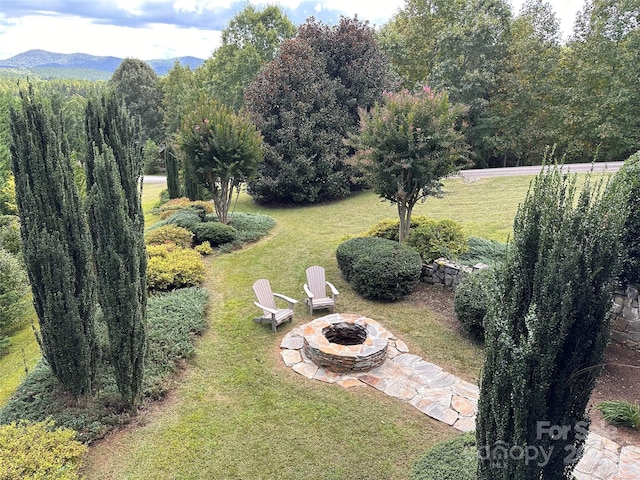 202 Panorama Dr, Nebo, NC 28761 - view of green lawn featuring a fire pit and a mountain view