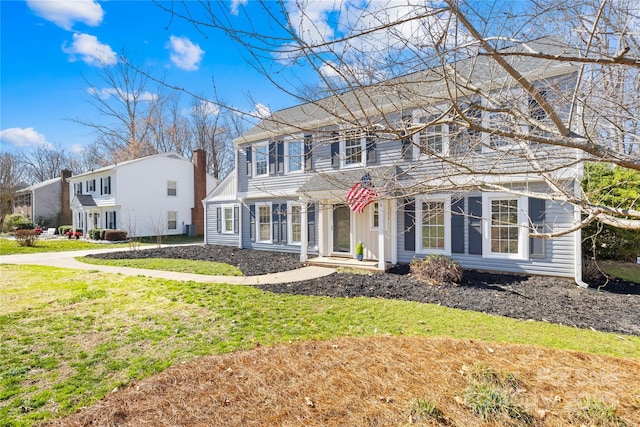 1133 Bloom Wood Ln, Matthews, NC 28105 - colonial-style house with a front lawn