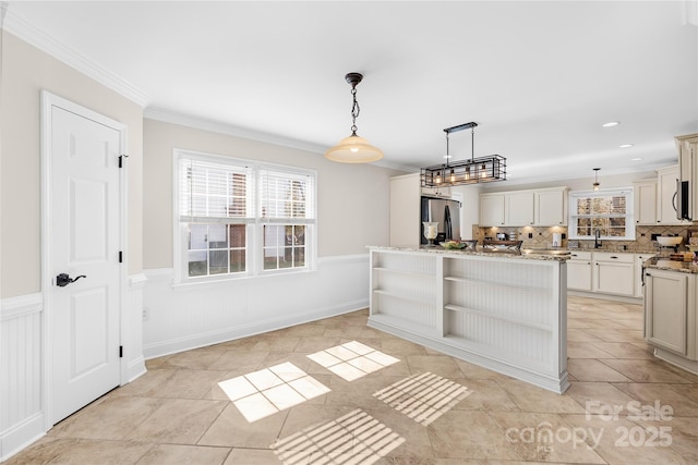 1133 Bloom Wood Ln, Matthews, NC 28105 - kitchen featuring open shelves, a sink, decorative light fixtures, appliances with stainless steel finishes, and light stone countertops