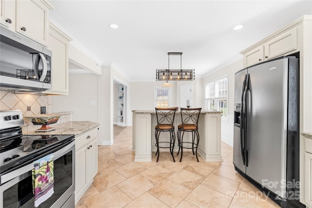 1133 Bloom Wood Ln, Matthews, NC 28105 - kitchen with recessed lighting, tasteful backsplash, stainless steel appliances, and a breakfast bar