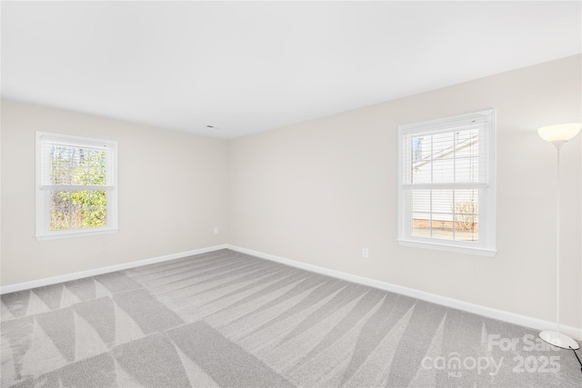 1133 Bloom Wood Ln, Matthews, NC 28105 - carpeted spare room featuring baseboards