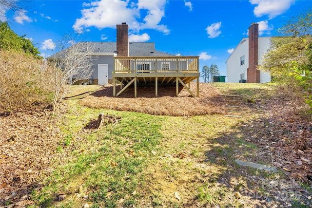 1133 Bloom Wood Ln, Matthews, NC 28105 - rear view of property featuring a wooden deck and a chimney