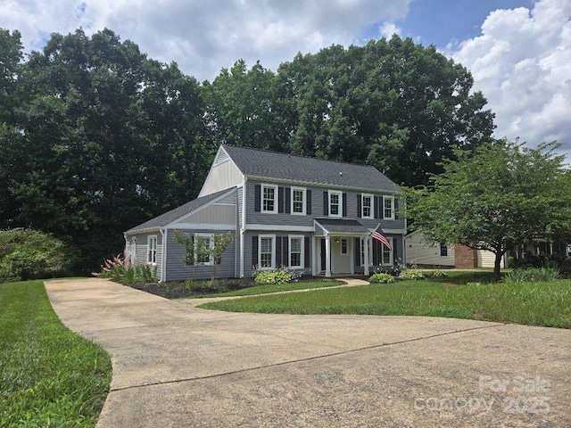 1133 Bloom Wood Ln, Matthews, NC 28105 - view of front of property featuring concrete driveway and a front lawn