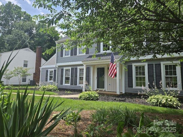 1133 Bloom Wood Ln, Matthews, NC 28105 - view of front of property with a front lawn