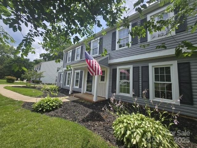 1133 Bloom Wood Ln, Matthews, NC 28105 - view of front facade featuring a front yard