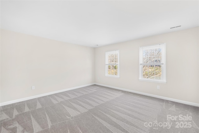 1133 Bloom Wood Ln, Matthews, NC 28105 - carpeted spare room featuring baseboards