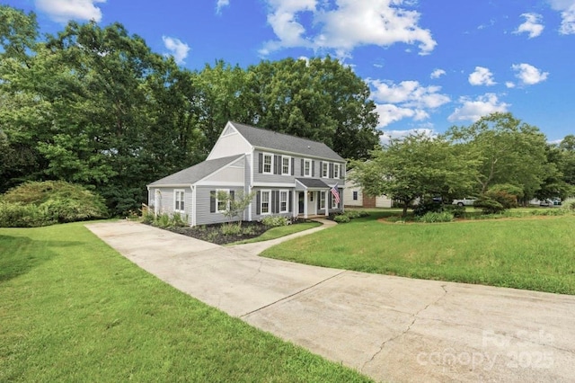 1133 Bloom Wood Ln, Matthews, NC 28105 - view of front of house with concrete driveway and a front lawn