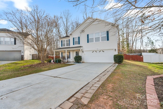 view of property featuring a garage, a porch, and a front yard