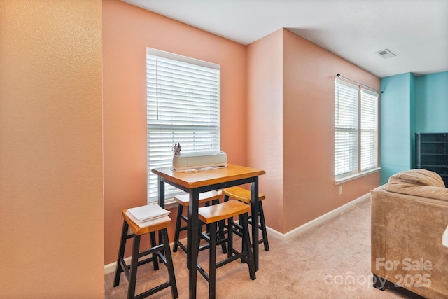 view of carpeted dining room