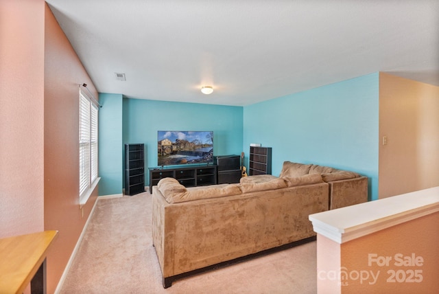 living room featuring light colored carpet