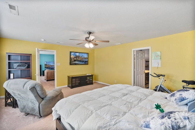 carpeted bedroom featuring ceiling fan