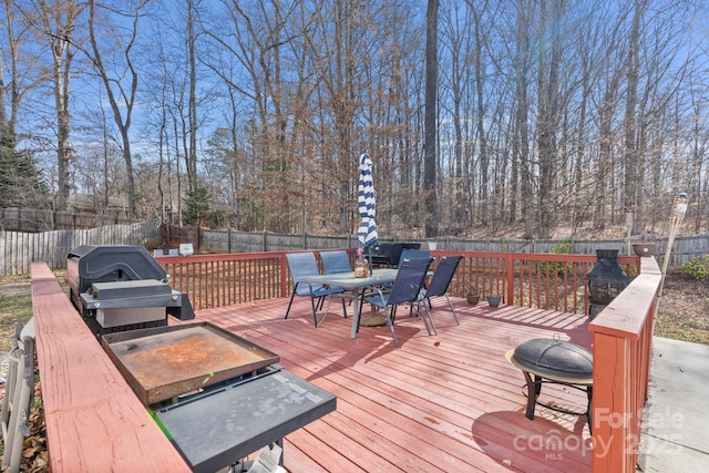 wooden deck with area for grilling