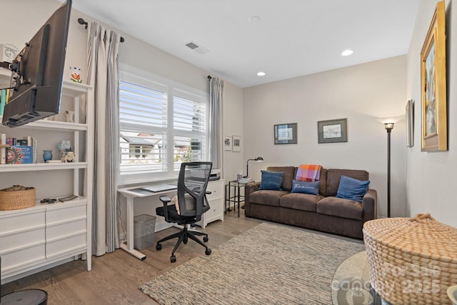 home office with visible vents, wood finished floors, and recessed lighting