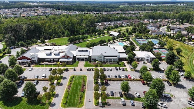 birds eye view of property with a residential view