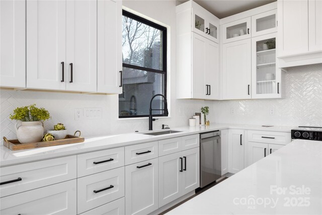 17201 Green Hill Rd, Charlotte, NC 28278 - kitchen with light countertops, stainless steel dishwasher, and a sink