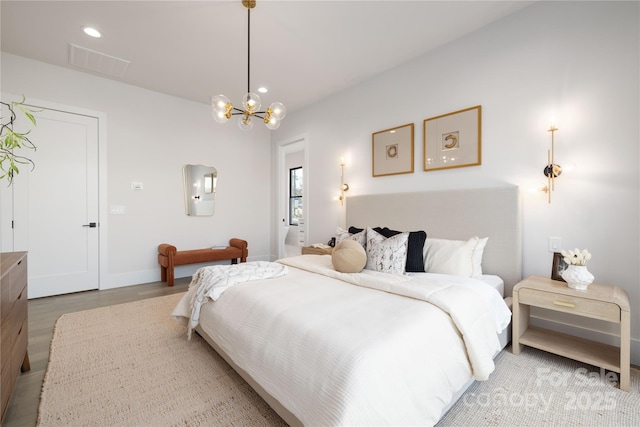 17201 Green Hill Rd, Charlotte, NC 28278 - bedroom featuring recessed lighting, a notable chandelier, visible vents, baseboards, and wood finished floors