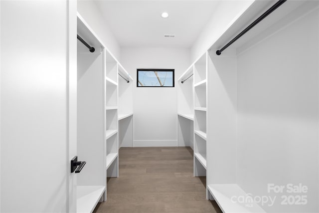 17201 Green Hill Rd, Charlotte, NC 28278 - spacious closet featuring wood finished floors and visible vents