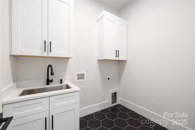 17201 Green Hill Rd, Charlotte, NC 28278 - clothes washing area with washer hookup, a sink, electric dryer hookup, baseboards, and cabinet space