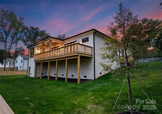 17201 Green Hill Rd, Charlotte, NC 28278 - back of property with fence, a wooden deck, crawl space, a lawn, and brick siding