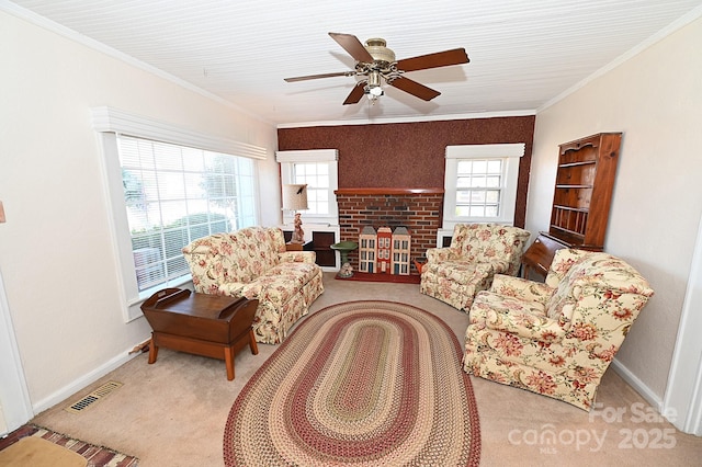 living room with ceiling fan, crown molding, and light carpet