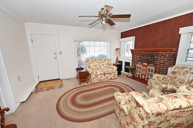 living room with ceiling fan, ornamental molding, and light colored carpet