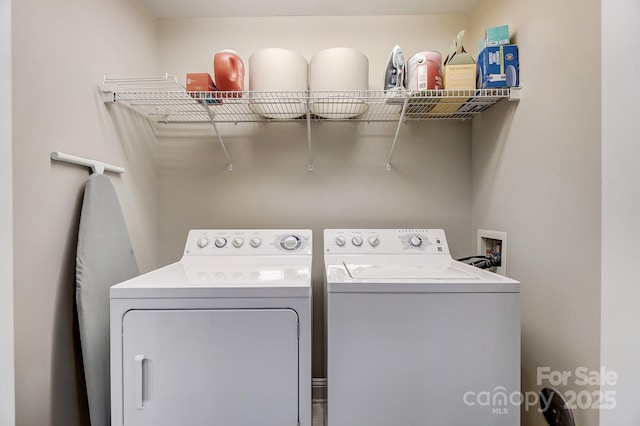 laundry room featuring laundry area and separate washer and dryer