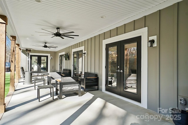 view of patio featuring ceiling fan and french doors