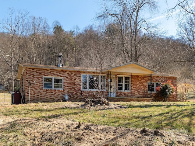 ranch-style house with a front yard