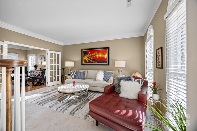 living room featuring ornamental molding and french doors