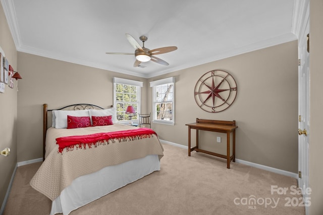 carpeted bedroom featuring ornamental molding and ceiling fan