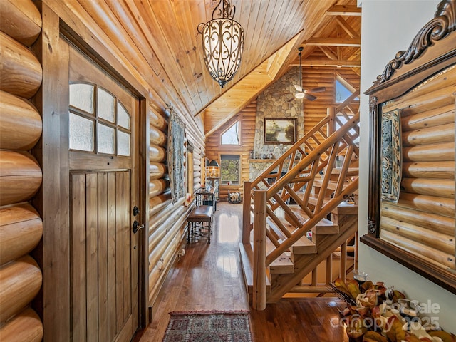entrance foyer featuring stairs, high vaulted ceiling, wooden ceiling, and hardwood / wood-style flooring