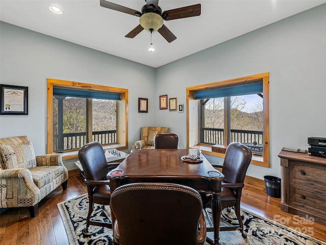 home office featuring hardwood / wood-style floors, a ceiling fan, and recessed lighting