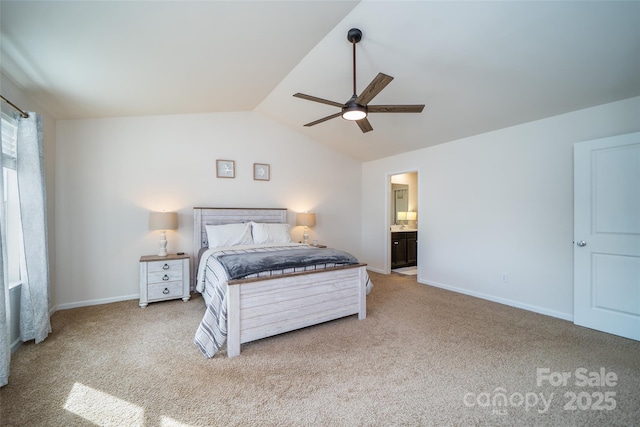 bedroom with carpet floors, baseboards, vaulted ceiling, and a ceiling fan