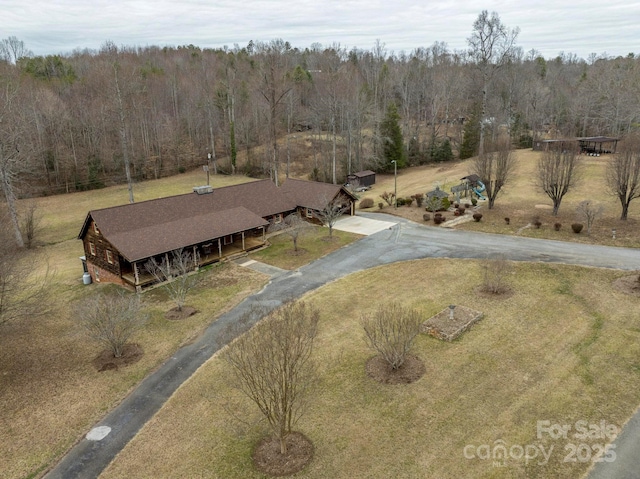 bird's eye view with a forest view