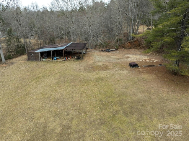 aerial view featuring a forest view