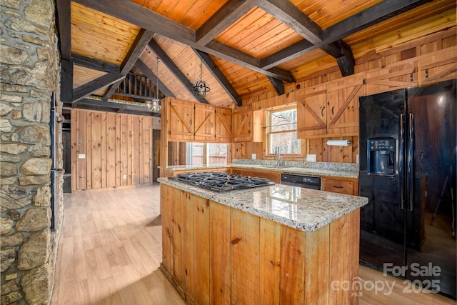 kitchen featuring wooden ceiling, wooden walls, black appliances, and light wood finished floors