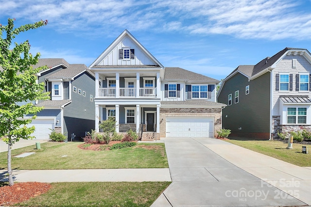 805 Deep River Way, Waxhaw, NC 28173 - craftsman-style house featuring board and batten siding, covered porch, a front lawn, concrete driveway, and an attached garage