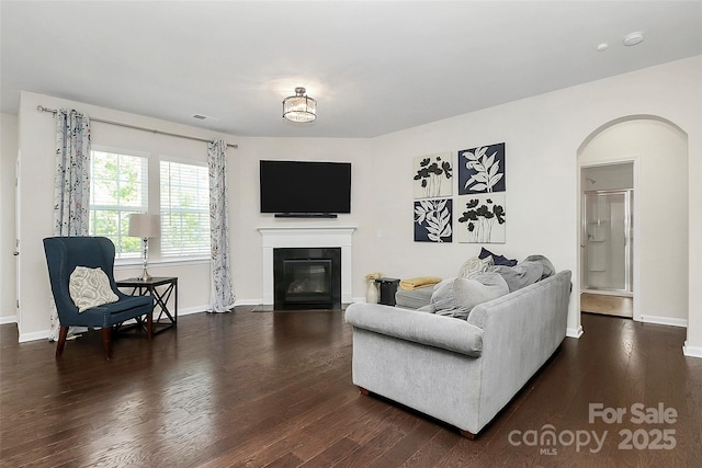 805 Deep River Way, Waxhaw, NC 28173 - living room with a fireplace with flush hearth, visible vents, dark wood finished floors, and baseboards