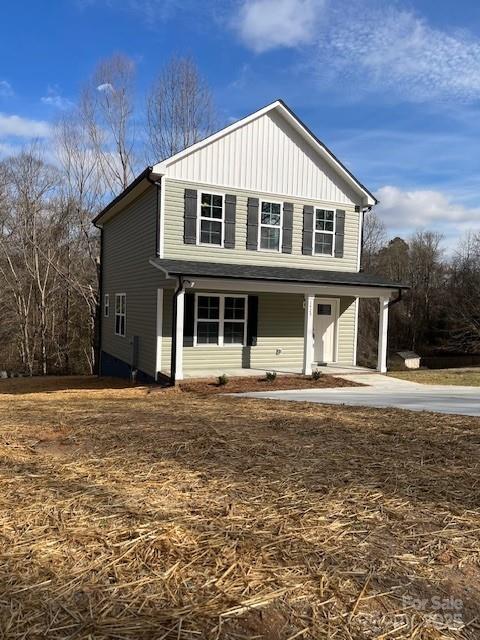 view of front of home with a porch and board and batten siding