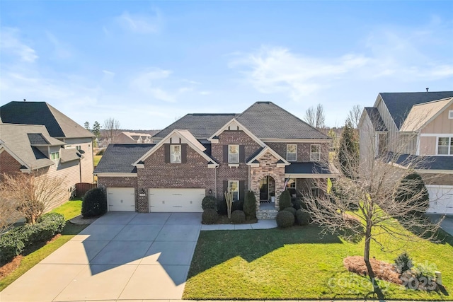 view of front of home featuring brick siding, an attached garage, a front yard, a residential view, and driveway