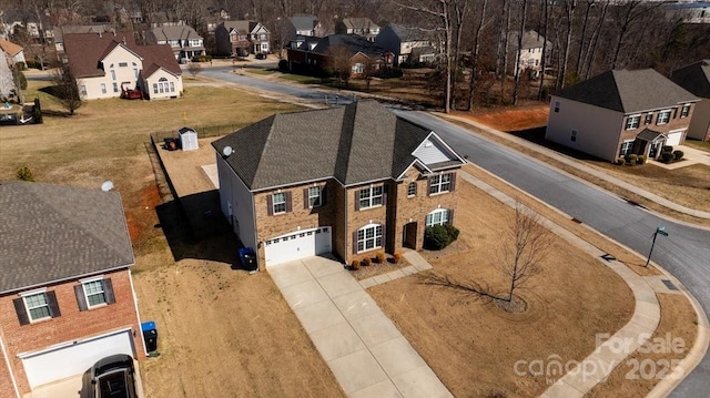 bird's eye view with a residential view